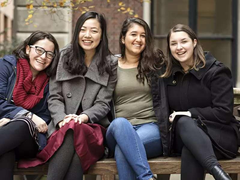 Image of four Barnard student sitting